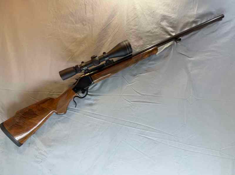 BROWNING B-78 300 WIN MAG W LEUPOLD 3-9X50 MINT